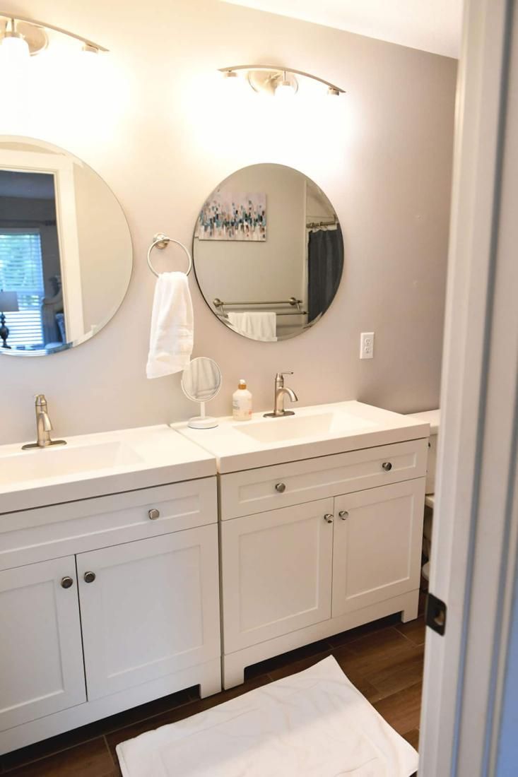 Bathroom vanity with round mirrors