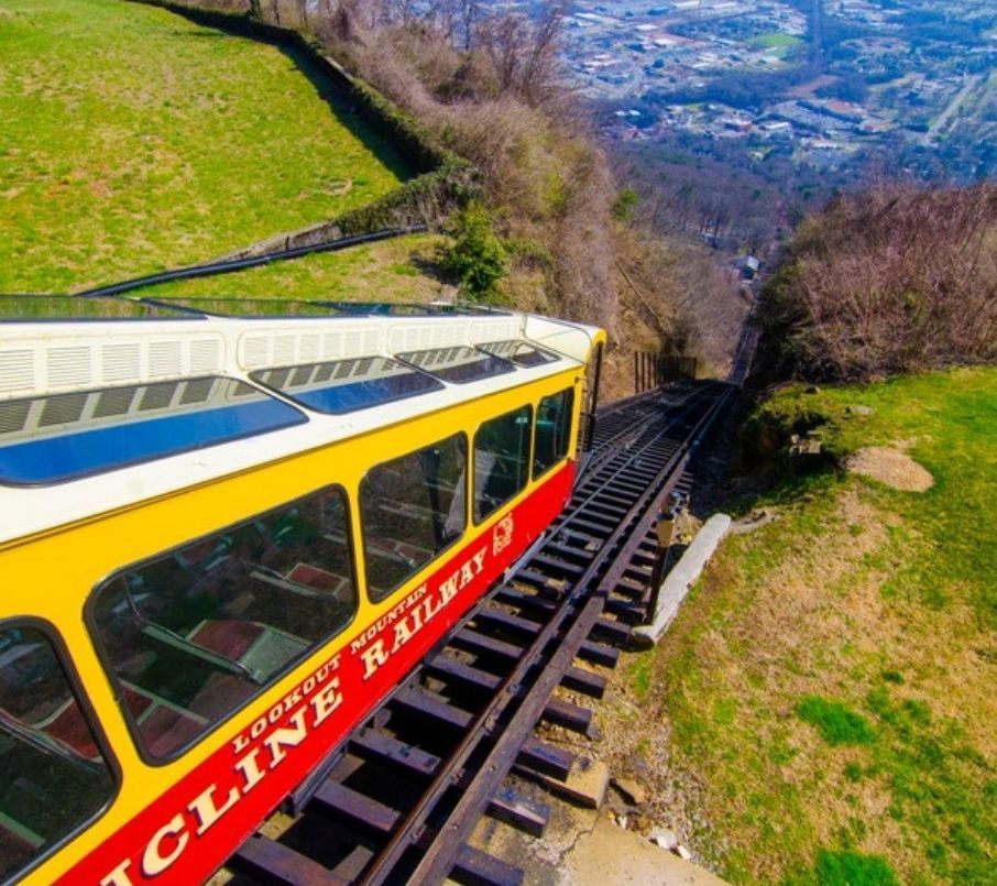 The yellow Incline Railway car climbing Lookout Mountain