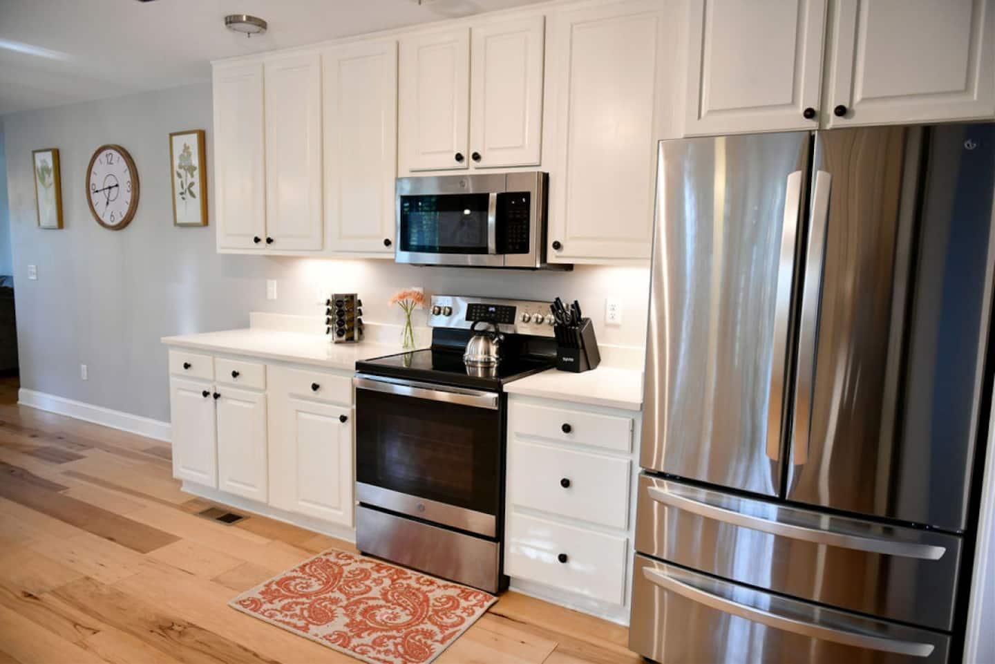 Kitchen with stainless fridge and range